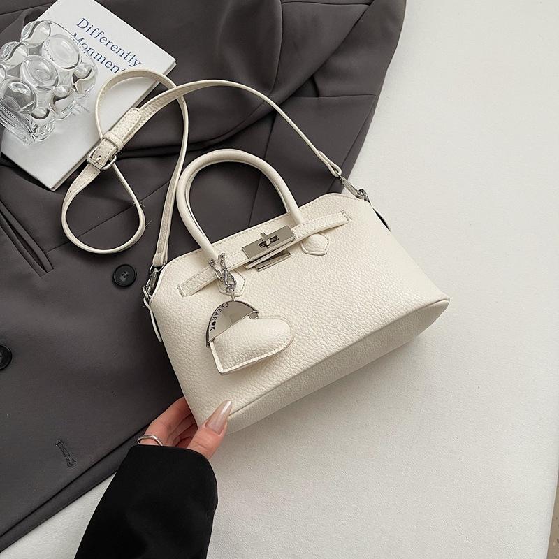 Simple temperament hand bag women's spring new niche fashion messenger bag commuter shoulder bag