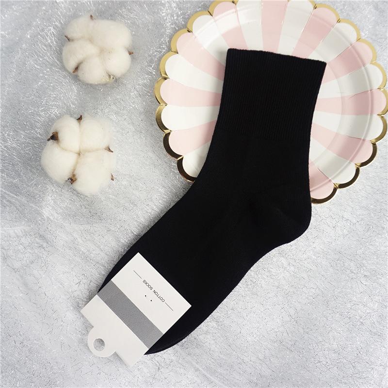 Damen Herbst- und Winter Baumwolle Lockerer Bund Zieht den Fuß nicht Hochrohrsocken