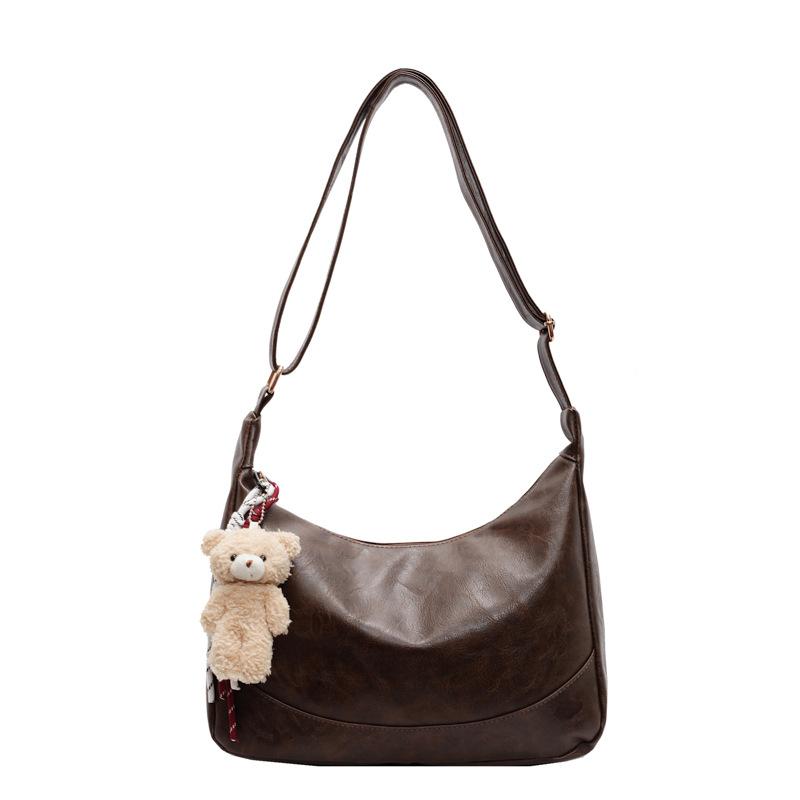 

Large-capacity commuter underarm tote bag women s bag trendy autumn and winter new simple and lightweight versatile single shoulder oblique span bag темно-коричневого