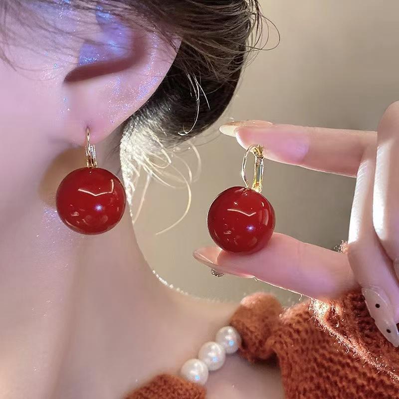 Hong Kong style elegant temperament pearl earrings women's ear buckle type niche unique design earrings European and American cold wind earrings