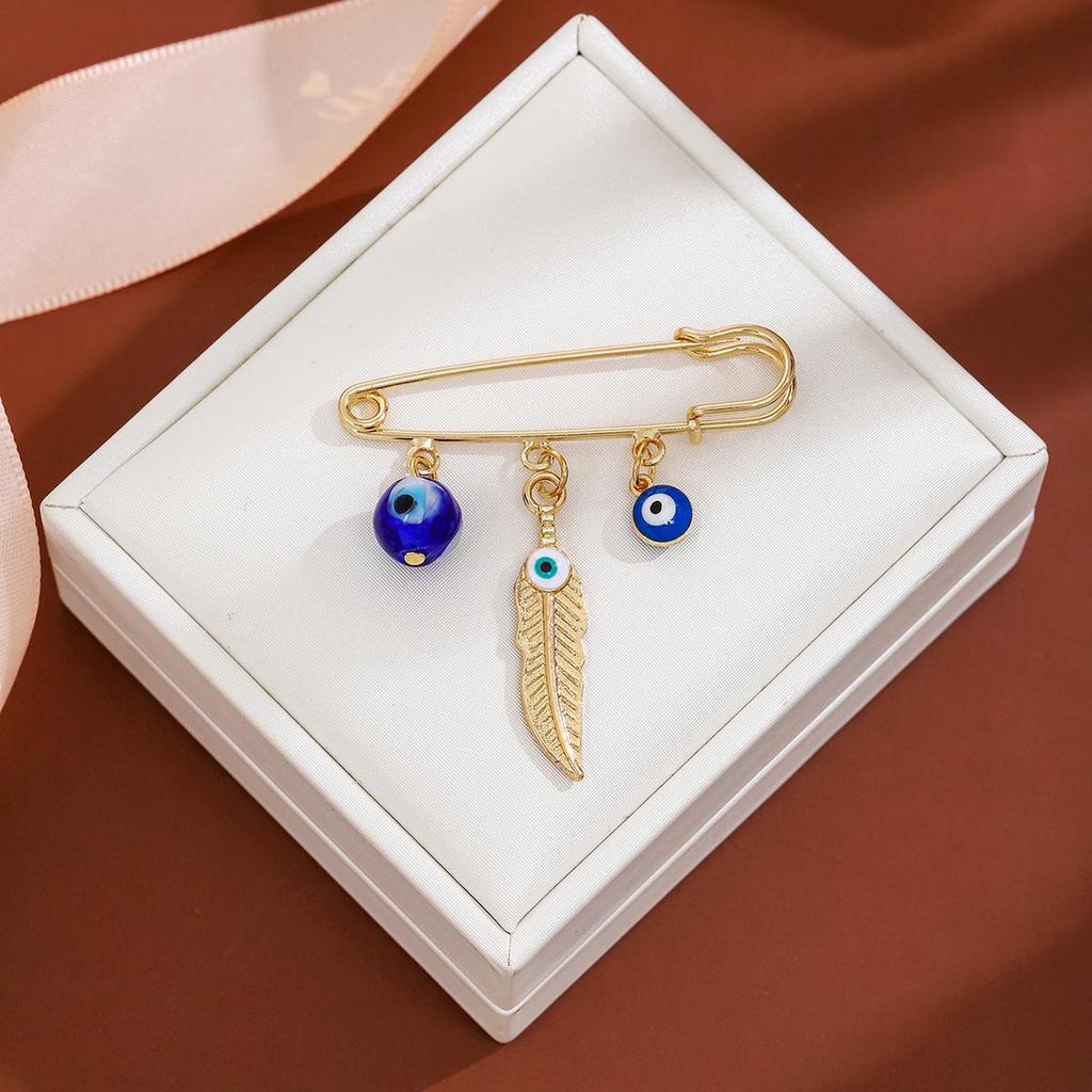 Creative Rhinestone Devil's Eye Tassel Brooch: Women's High-End Blue-Eyes Sweater Pin