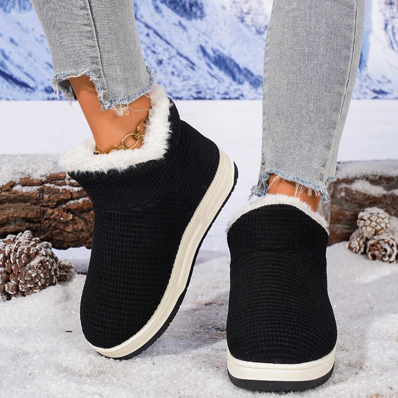 Non-slip thick-soled winter warm cotton slippers are all-inclusive, and men's and women's indoor soft-soled piled and thickened fluffy cotton shoes.