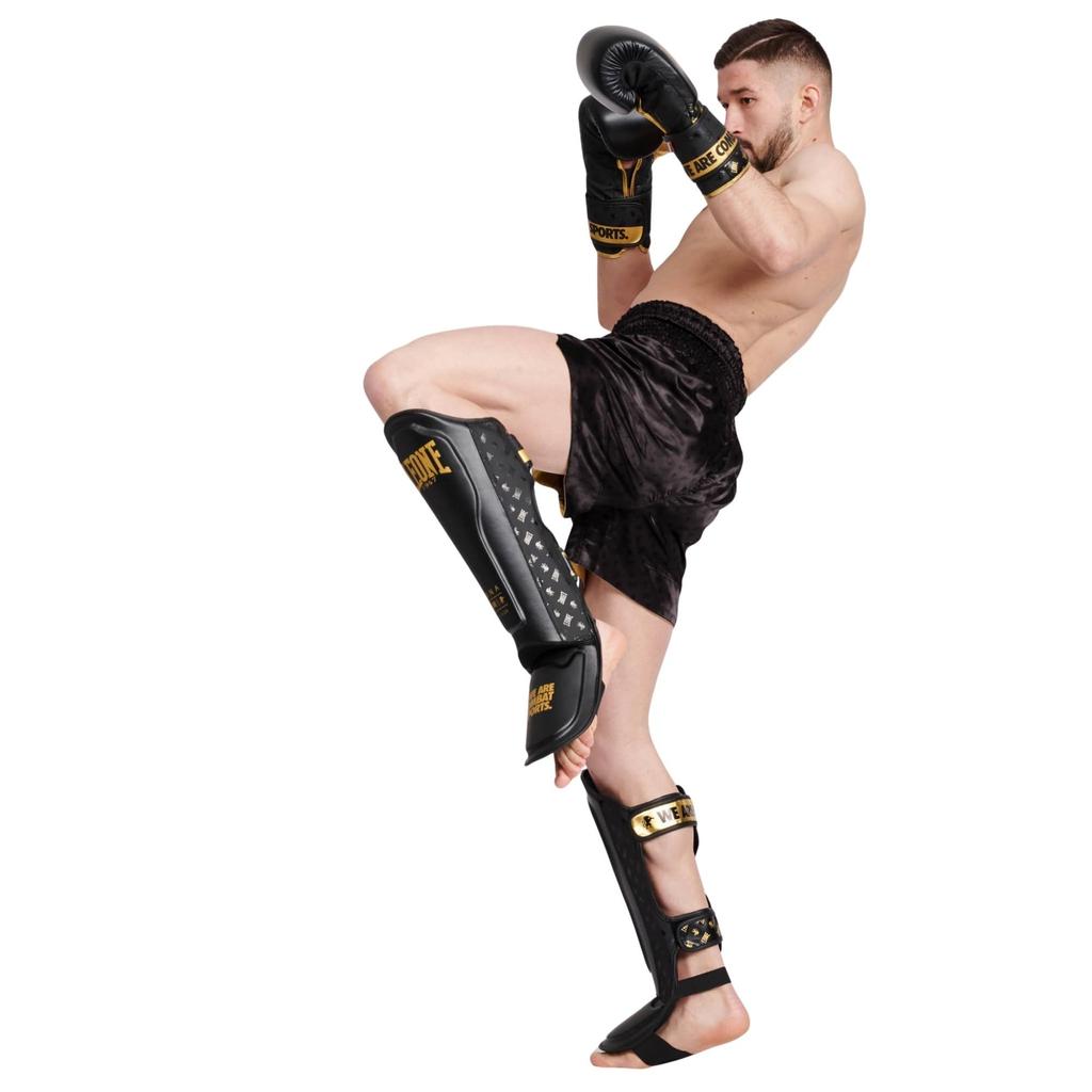LEONE 1947 Bojové sporty Kickbox MMA Chrániče holení Unisex FULL chrániče nohou s EVA gelovými vložkami M PT177 [DNA PROTECTION] & Velikost/Černá [Originální]