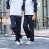Unisex Dark Blue School Pants with Red Stripe - Loose, Straight-Leg Design for Primary To High School Students.