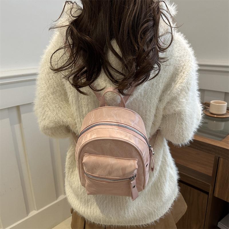 Schoolbag Korean version of simple small bag women's 1011 fashion new small backpack casual simple texture commuter travel backpack