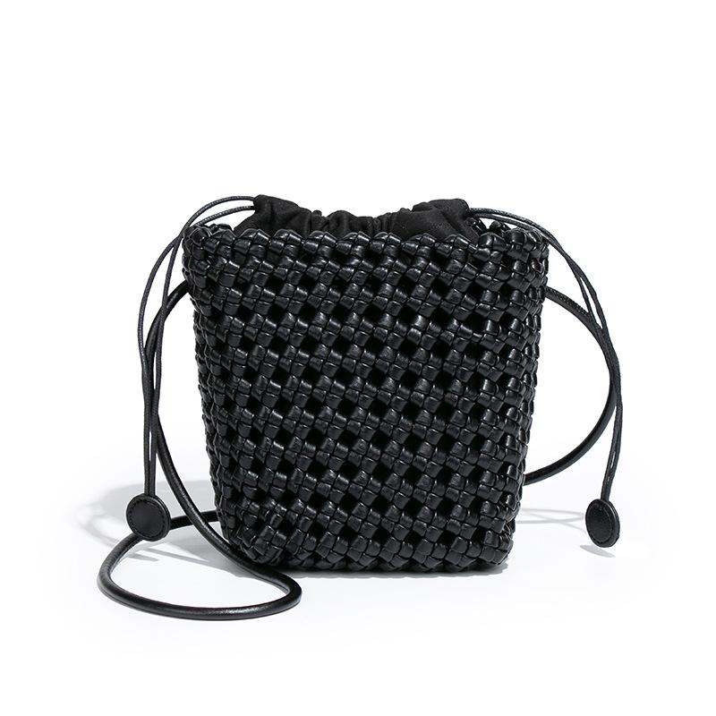

Niche personality windmill knot hollow woven women s bag drawstring mother bucket bag vacation style casual versatile messenger bag