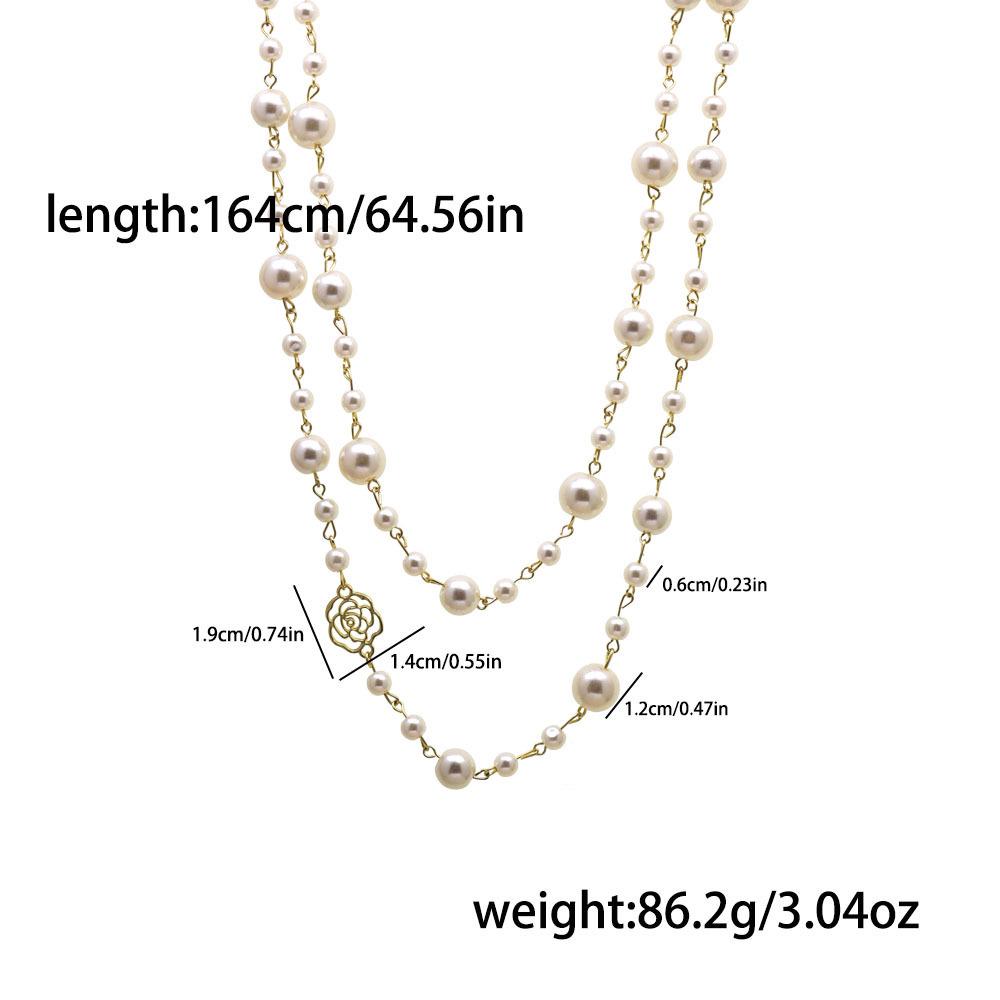 Korean Long Pearl Necklace: Trendy Multi-layer Hollow Flower Sweater Chain for Women