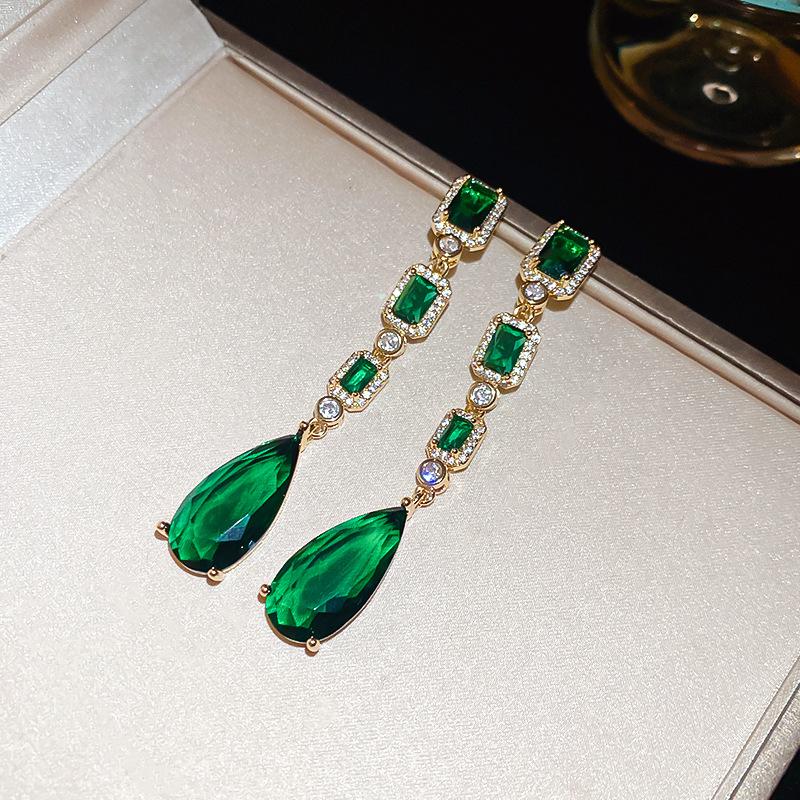 

Европейские и американские серьги-пусеты с геометрическим дизайном в виде цветка из зеленого циркона – Роскошный, универсальный дизайн