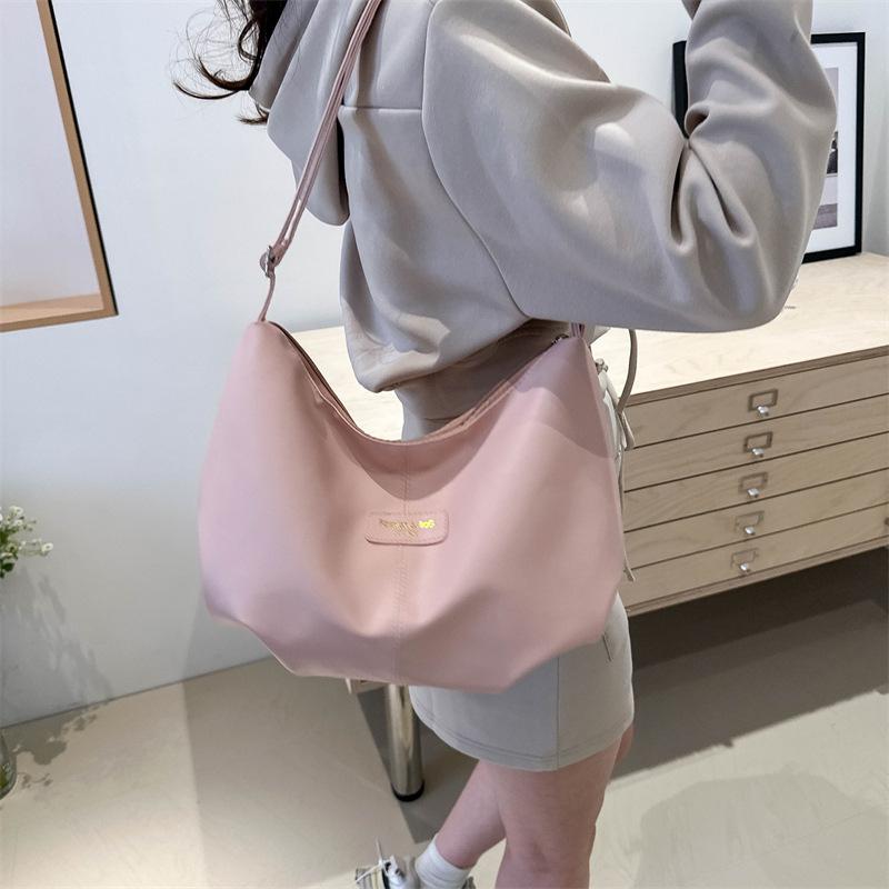 New Urban Large-capacity Fashionable and Simple Solid Color Casual Solid Color Pendant Exquisite Single Shoulder Diagonal Span Armpit Bag