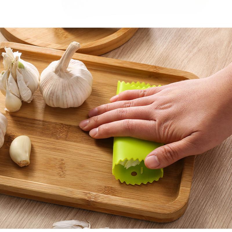 Kitchen Artifact Garlic Peeler, Manual Garlic Peeler, A Simple And Creative Kitchen Tool.