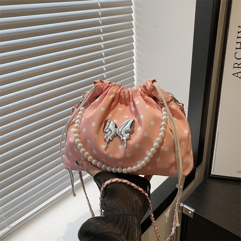 

Popular fashion foreign gas bag versatile polka dot drawstring bucket bag 2025 new girl pearl bag shoulder messenger bag