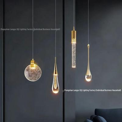 Nordic Luxury Crystal Pendant Light - Modern Teardrop Design for Living Room or Bedroom Decor.