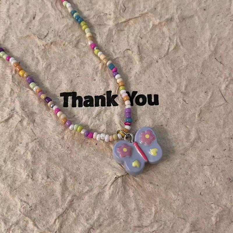 Simple color gradual change painted butterfly beaded necklace women's fashion temperament high sense sweet cool wind versatile collarbone chain