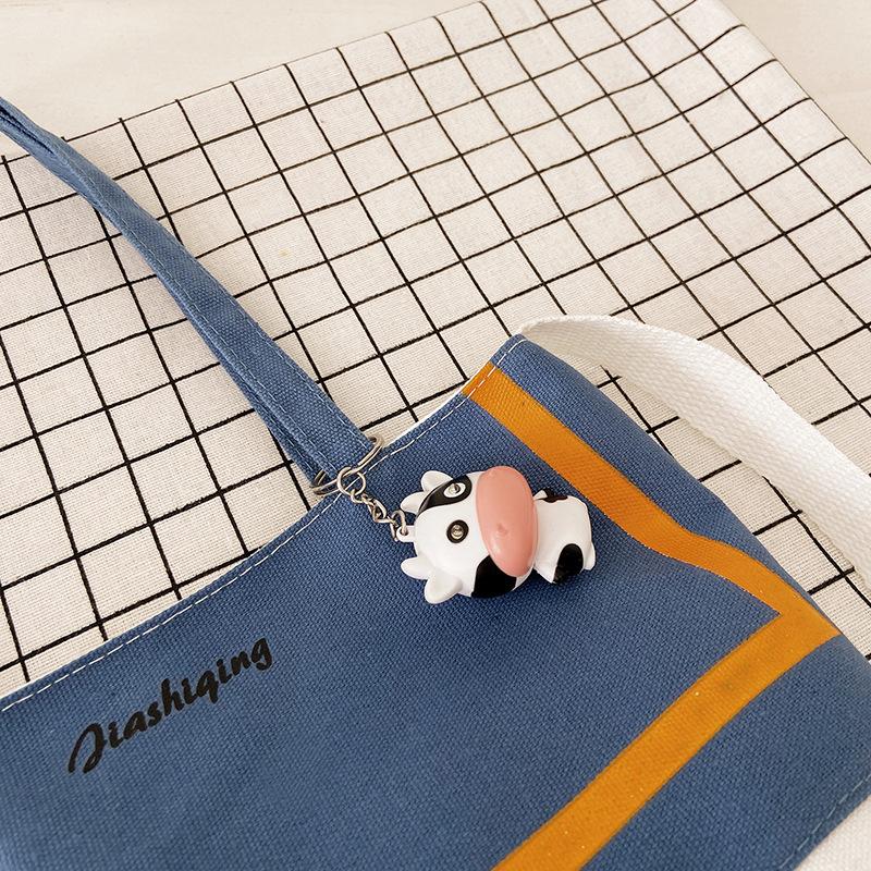 

Canvas bag 2 new women s bag fashionable and sweet contrasting color shoulder messenger bag