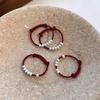 Trendy Ethnic Red String Woven Bead Ring for Women - Simple, Fashionable, Versatile Chinese Style Finger Accessory.