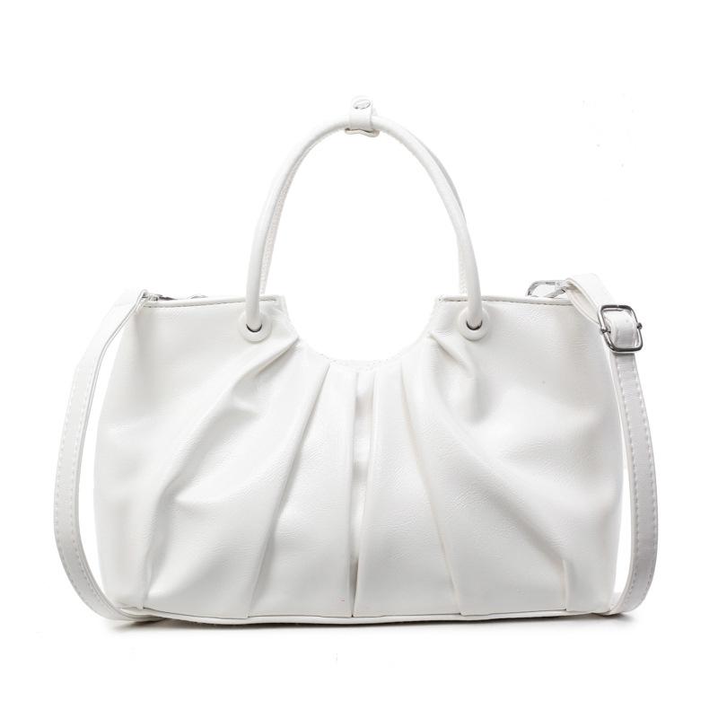 Korean version of foreign style niche design pleated handbag bag women's versatile foreign style advanced sense oil wax leather commuter messenger bag