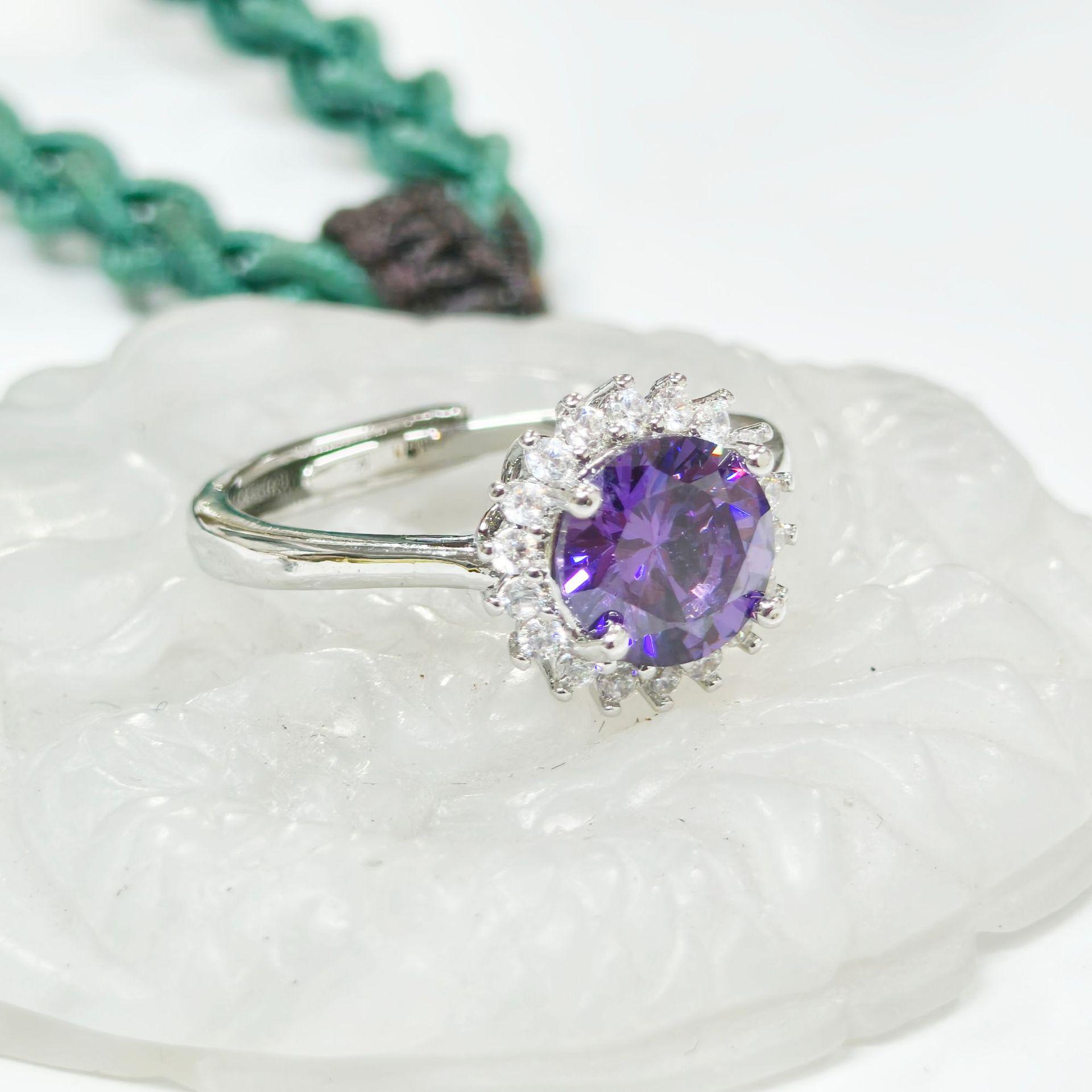 Gessen Jewelry Starburst Blue Zircon Three-piece Set: Fashionable Ring, Earrings, and Pendant.
