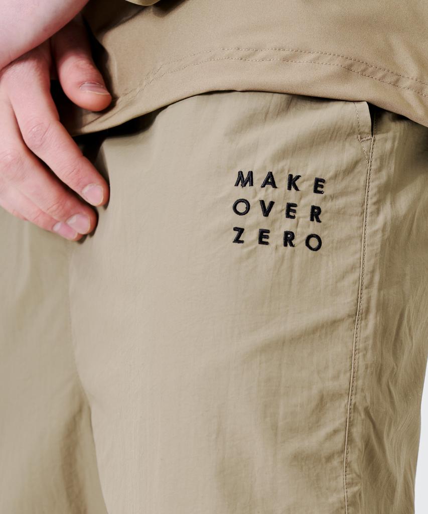 MOZMOZ Square Embroidered String Nylon Track Pants Beige