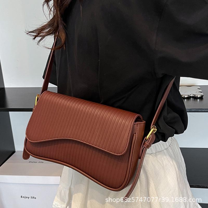 Textured handbag 2025 spring new women's bag niche retro shoulder bag personalized striped crossbody bag trend