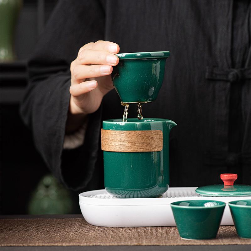 Ge kiln ceramic kung fu tea set, one pot of four cups, outdoor portable travel tea set, teacup gift souvenir