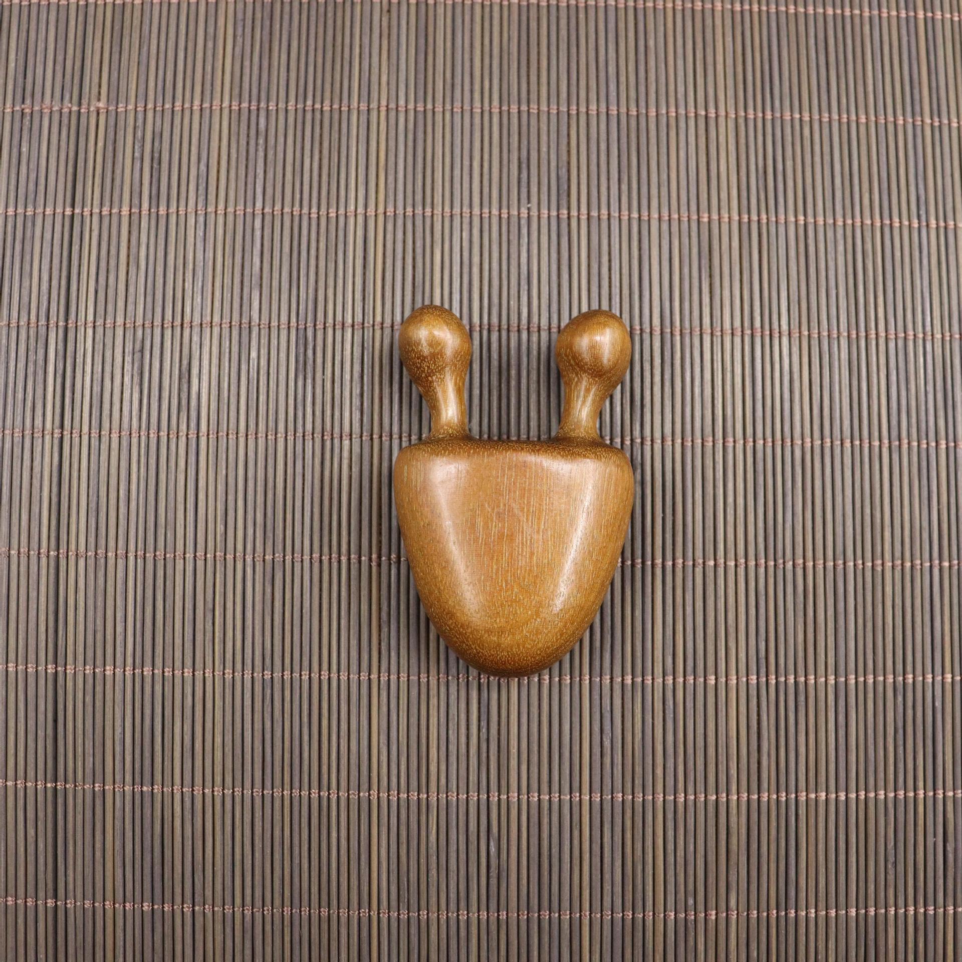 

Golden Sandalwood Round Head Massage Comb for Scalp and Body