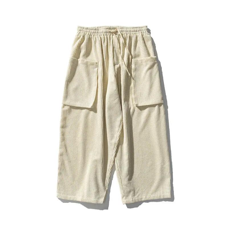

Осенняя мужская уличная одежда Брюки с широкими штанинами Мужские свободные однотонные брюки Мужские гаремные брюки оверсайз Модные женские брюки карго L бежевый