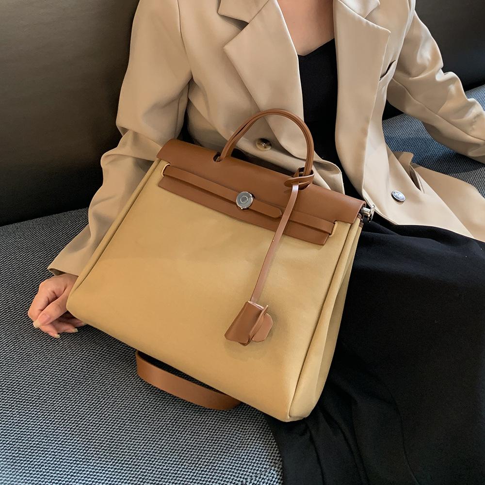 New Autumn and Winter Fashion Women's Handbag, Niche High-end Waterproof Canvas Crossbody Bag with Button Closure and Flap Design, Kelly Bag