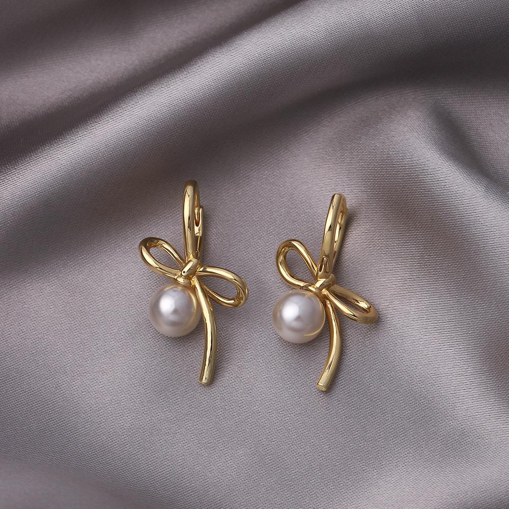 Luxury Asymmetrical Bow Pearl Earrings for Women - Ear Studs, Cuffs & Hoops for Round, Square Faces.