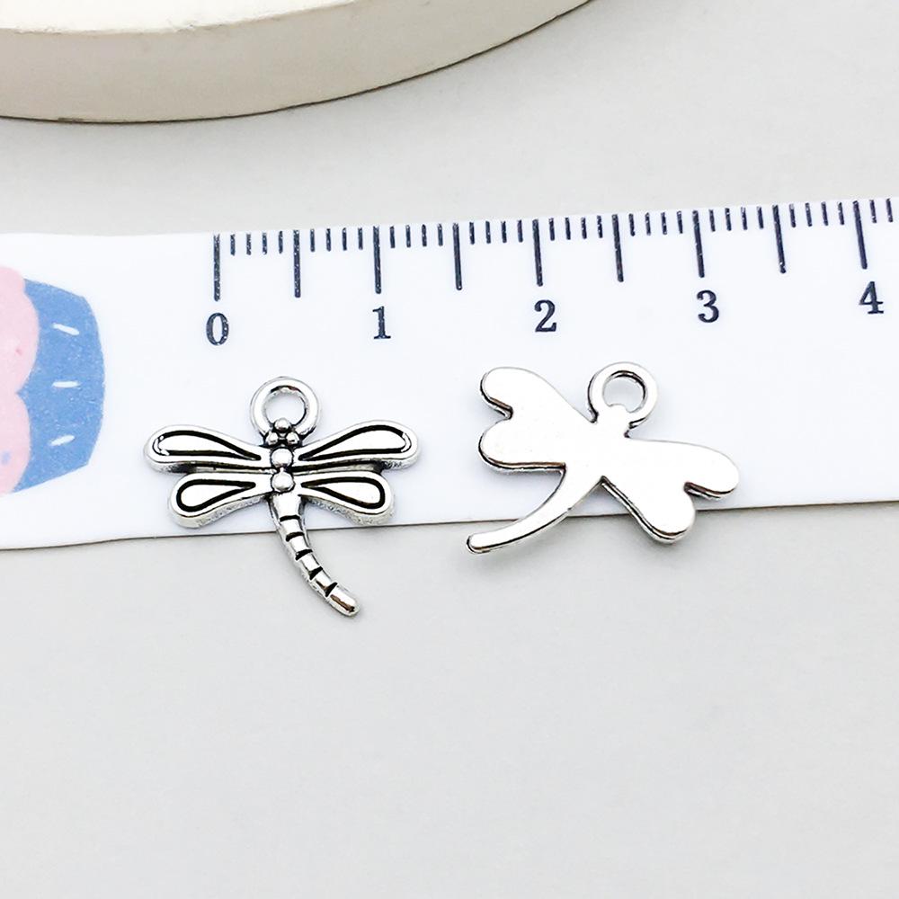 Set di 100 Ciondoli Gatto Farfalla Luna Argento Antico per Braccialetti e Collane Fai da Te