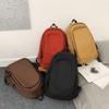 Spring new college style solid color student schoolbag Korean version large-capacity junior high school backpack