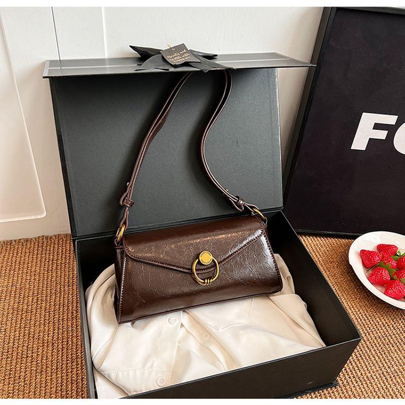 

French Niche Style Underarm Bag Female 2025 New Arrival Tide Fashion Advanced Texture Baguette Bag Mid-Ancient Shoulder Messenger Bag Curry