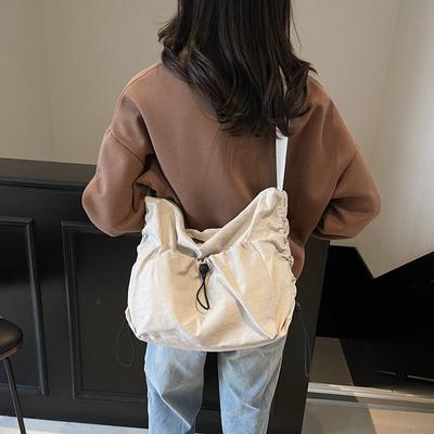 Large Capacity Messenger Bag Canvas Bag Women's New Versatile Niche Single Shoulder High Sense Commuter Dumpling Bag