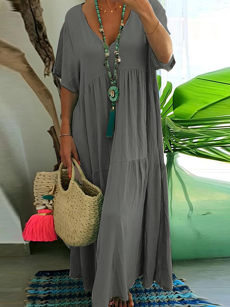 

Платье макси А-силуэта плиссированное однотонное с V-образным вырезом больших размеров - Коллекция Лето 2025 5XL серый