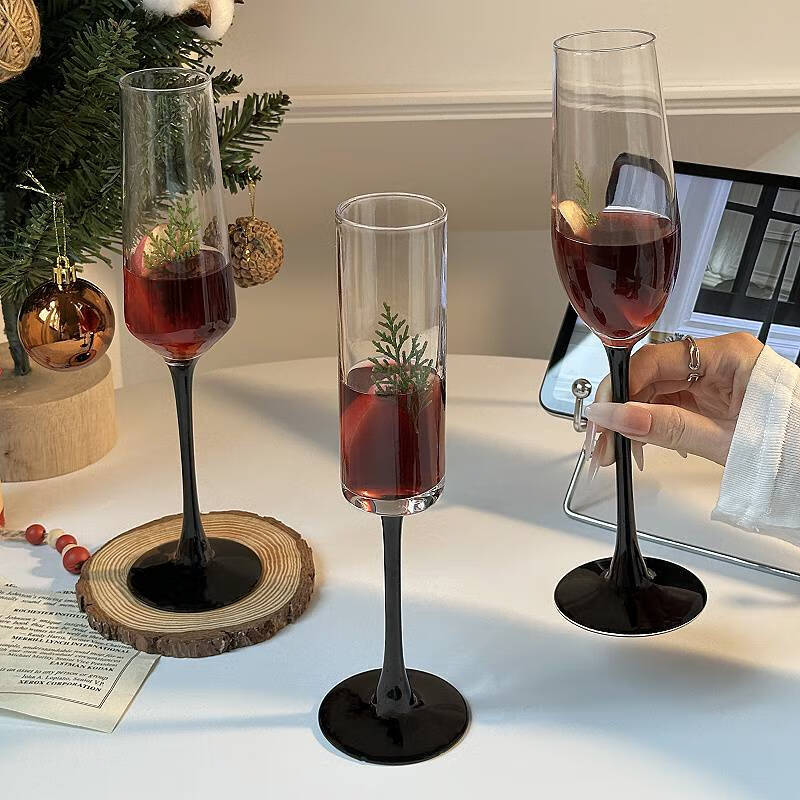Christmas red rodblack rod champagne glass feeling slightly drunk glass red wine glass tall cocktail glass sparkling wine glass