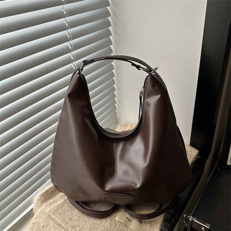 

Вместительная сумка для поездок на работу, женская, новая коллекция осень-зима 2025, ретро-модная сумка через плечо, корейская нишевая универсальная сумка-тоут кофейный