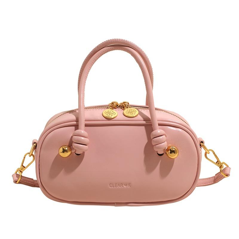 

Korean niche fashionable simple style portable Boston bag versatile commuter solid color temperament single shoulder messenger bag women