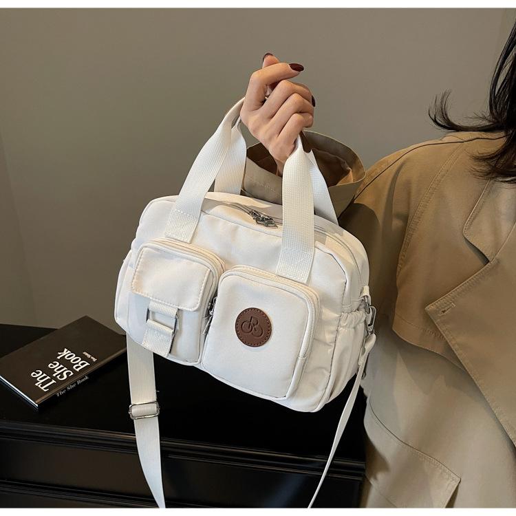 Multi-pocket retro casual handbag 2025 new nylon bag simple shoulder messenger bag
