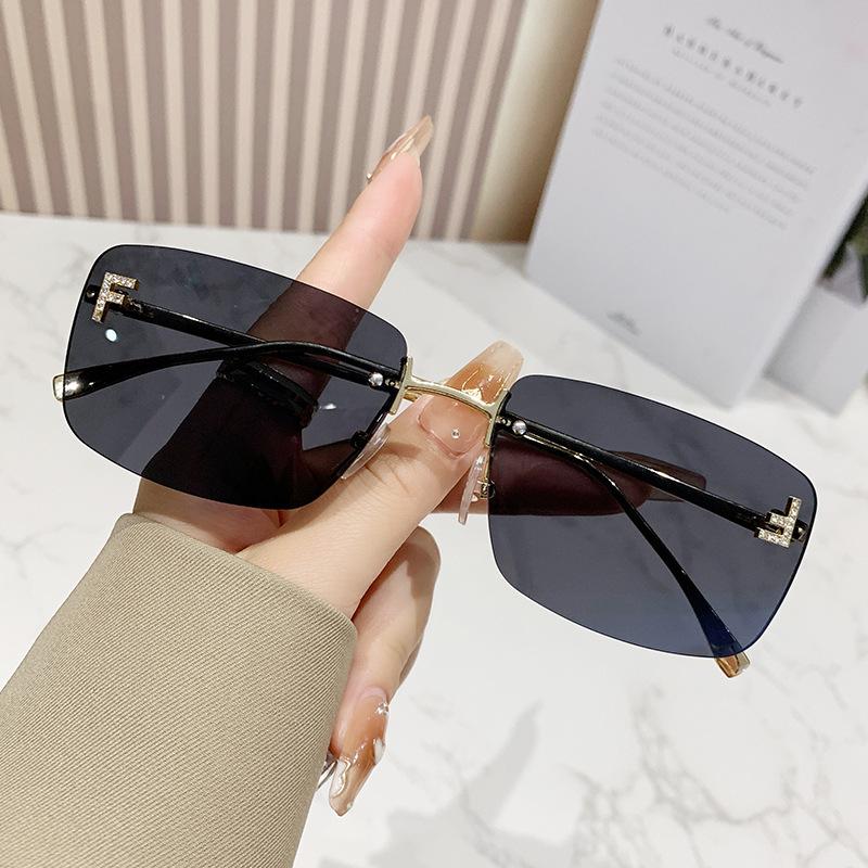 Ruiao rimless sunglasses UV400 fashion square metal glasses for women luxury brand designer diamond y2k small face sun glasses
