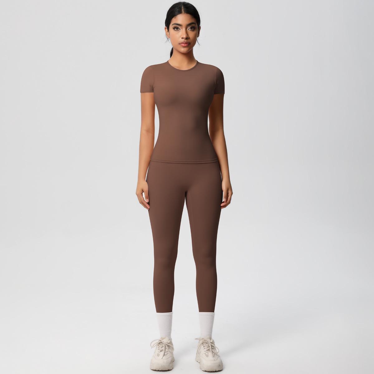 

Європейський та американський стиль, облягаючий комплект для йоги: Бежевий з начосом, Топ з коротким рукавом та Довгі штани з високою посадкою Small