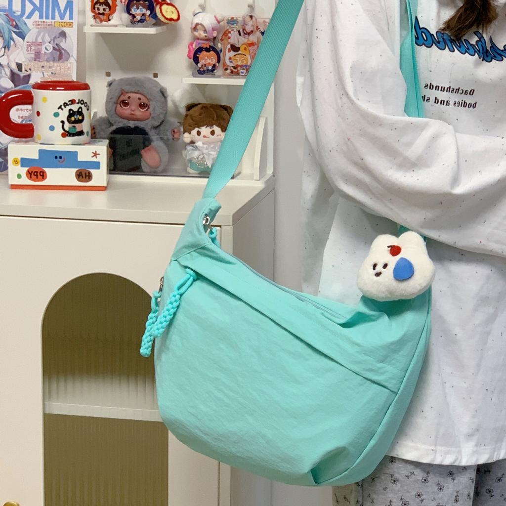 2025 nova bolsa de ombro estilo ins de nylon anti-respingos, bolsa mensageiro tipo dumpling, bolsa feminina para uso diário, trabalho, lazer