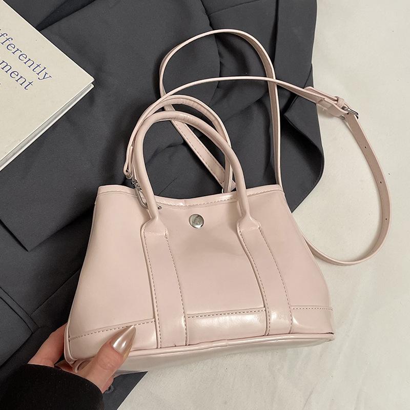 Korean New Product Sweet Cream Style Casual Portable Small Bag Temperament Versatile Simple Solid Color Commuter Messenger Women's Bag