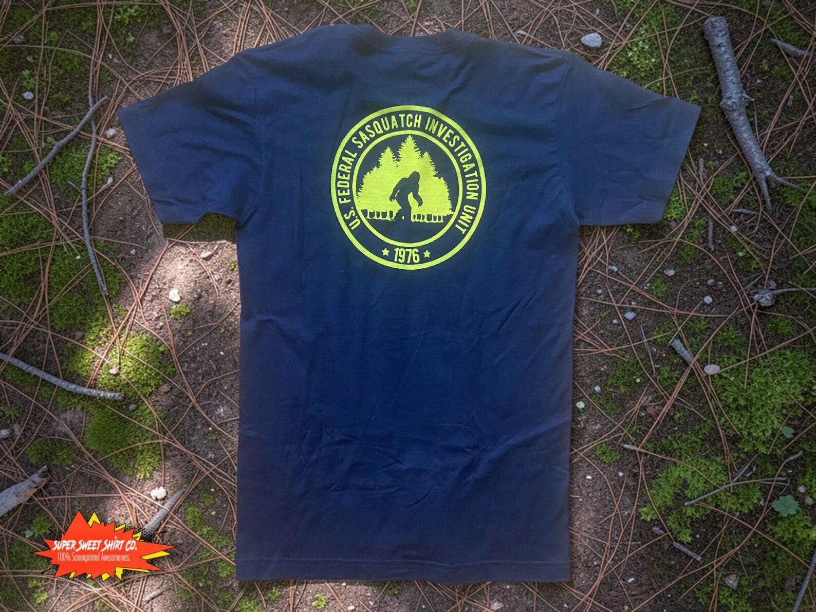 FBI Bigfoot Division Shirt | Funny Sasquatch T-Shirt | Cryptid Believer Gift | Unisex Graphic Tee | Bigfoot Hunter Shirt | Cryptozoology S