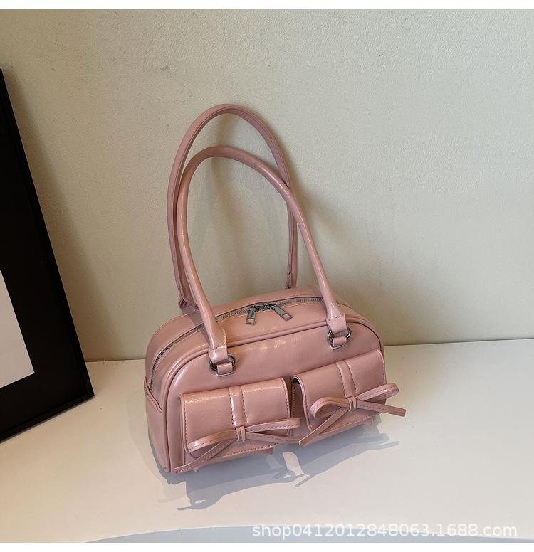 

Сумка из ПУ большой вместимости женская 2025 новая сумка-багет в балетном стиле с бантом, универсальная сумка через плечо розовый