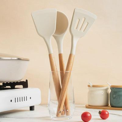 Beech Silicone Non-stick Kitchen Tools: Wooden Handle Spatula, Frying Shovel, and Soup Spoon.