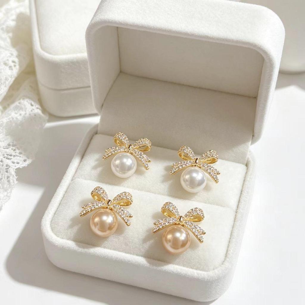 Exquisite Micro-inlaid Zircon Bow Pearl Stud Earrings for Women - Fashionable, Simple, and Versatile