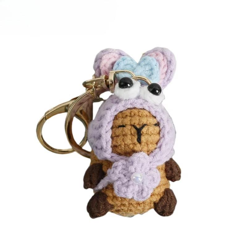 

Hand Woven Cross Dressing Capybara Doll Yarn Crochet Capibala Keychain Mini Bag Car Keychain Handmade Pendant Ornament