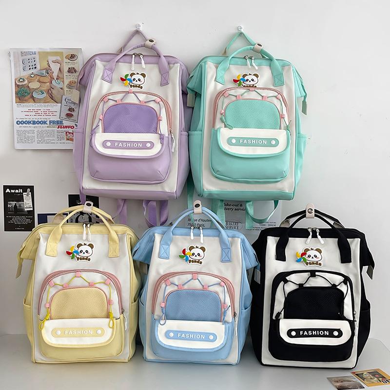 Koreanische Version von Nische Kontrastfarbe Niedlicher Rucksack für Frauen Neuer Student Große Kapazität Lässiger Rucksack Leichte Reise Doppelrucksack