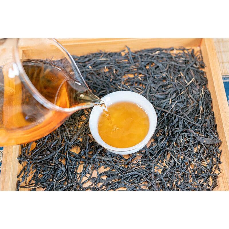 Fenghuang Qing Work Dian Hong Tee China Roter Lijiao Yunnan Uralter Baum Schwarzer Tee