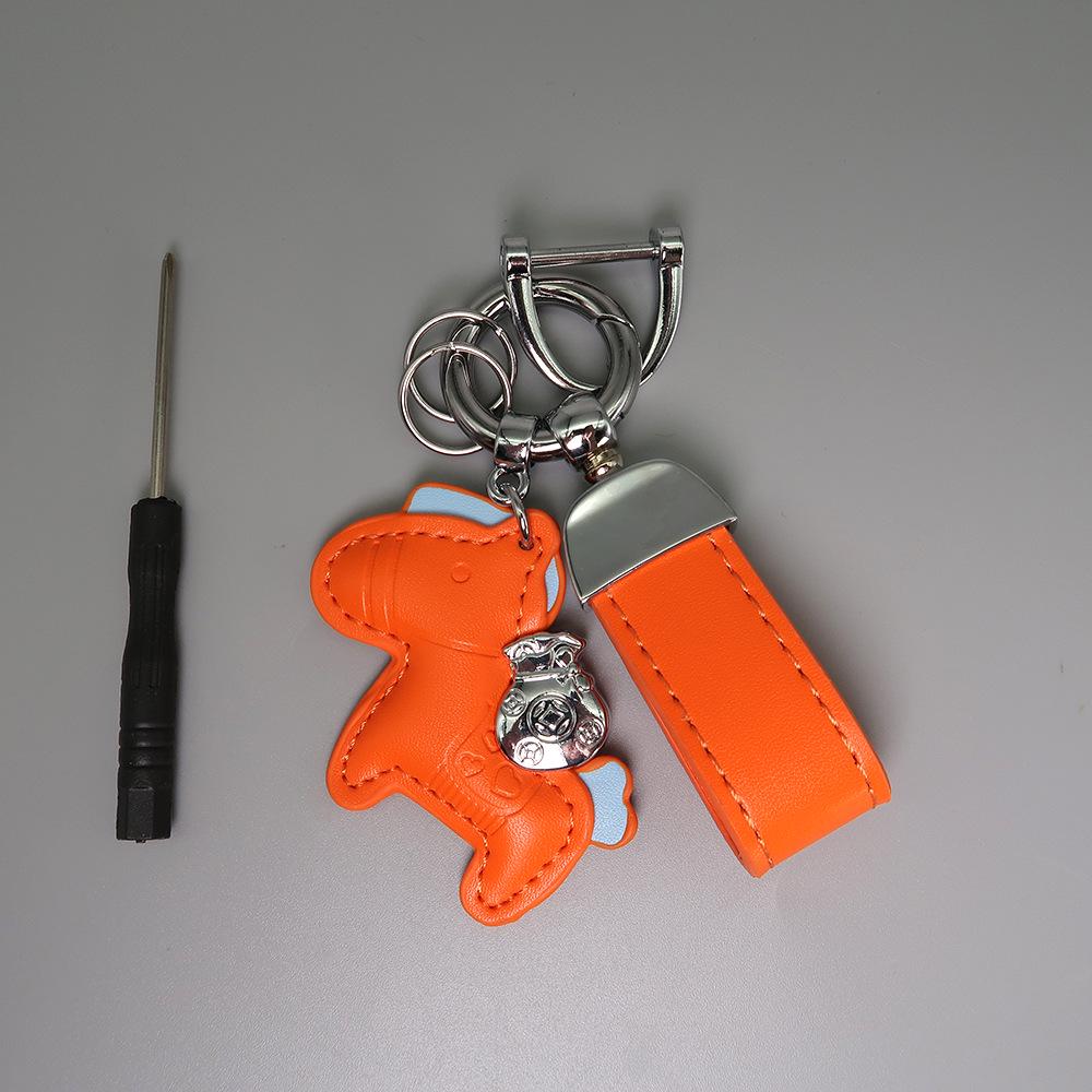 Instant Wealth Leather Keychain with Cartoon Pony Pendant for Couples – Trendy Bag and Car Accessory