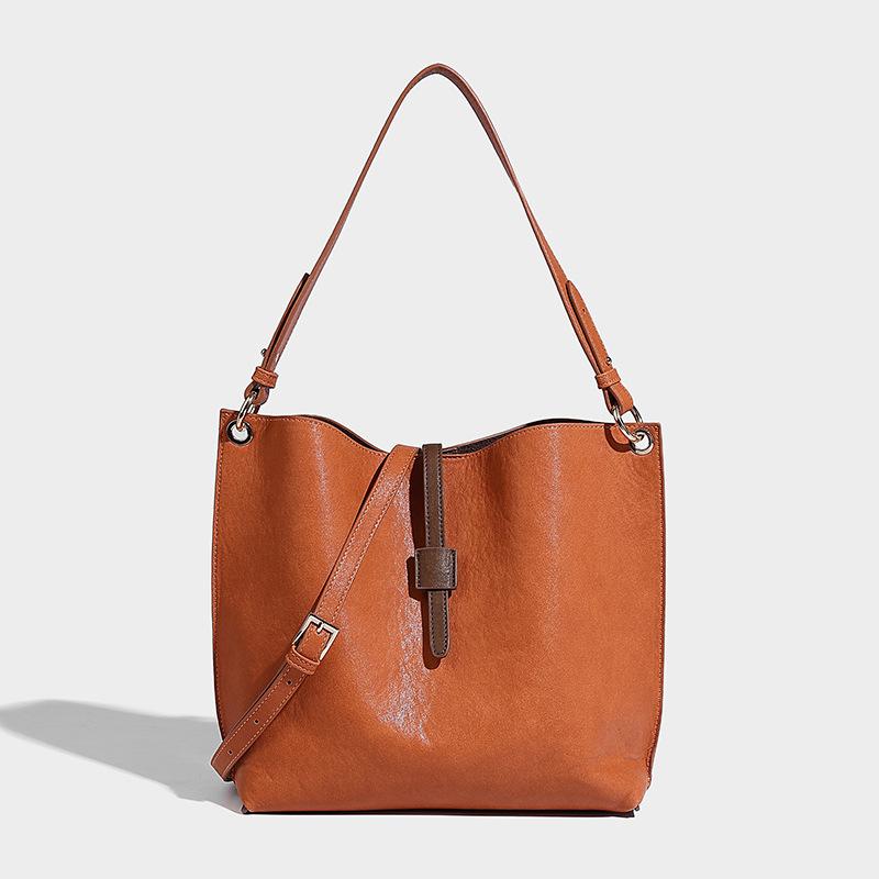 

High-end fashion single shoulder armpit 2024 autumn and winter new large-capacity bucket commuting versatile messenger bag помаранчевий